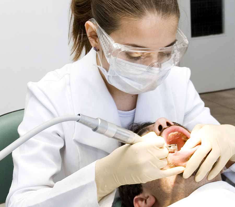Cleaning With Ultrasonic Scaler.